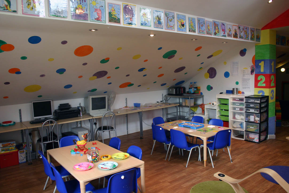 A bright activity room inside Seren Fach Nursery